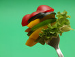 sliced vegetables on fork...