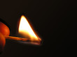 fired match in hand fired match in hand