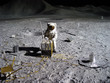 astronaut collecting lunar artifacts