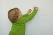 little child drawing on the wall little child drawing on the wall