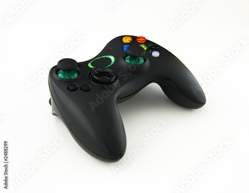 Photo: wireless gamepad on white background wireless gamepad on white background