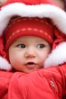 little girl wearing a red jacket