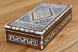 cigar box on wooden table