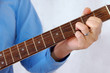 detail of guitar playing