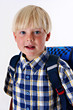 young child with a backpack