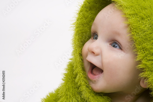 baby in green baby in green