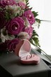 wedding rings in a pink box