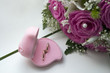wedding rings and bouquet of the bride