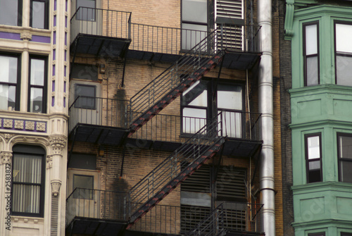 Photo: three buildings and a fire escape three buildings and a fire escape
