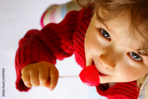 litlle girl with lollipop
