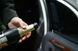 opening of a bottle with a sparkling wine