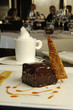 a chocolate dessert and coffee