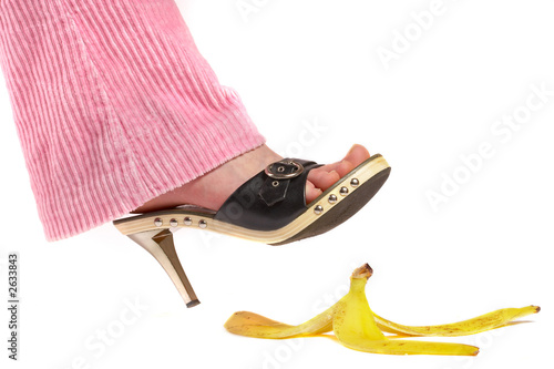 female leg(foot) and peel of a banana. life insurance.