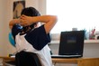 young boy work with laptop