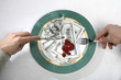 dollars as meal on a plate