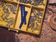 a set of screws on a tabler in a home's workshop