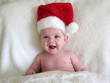 Foto: happy baby wearing santa hat happy baby wearing santa hat