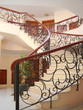interior of hotel with stairway and banisters interior of hotel with stairway and banisters