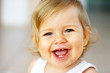 Foto: small baby laughing sincerely small baby laughing sincerely