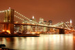 brooklyn bridge and manhattan skyline at night