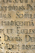 old stone with the letters,