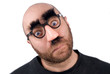 man wearing fake nose and glasses