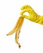 hand in yellow rubber glove with a banana peel 4 hand in yellow rubber glove with a banana peel 4