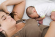 newborn baby of 7 days old sleeping with her mother newborn baby of 7 days old sleeping with her mother