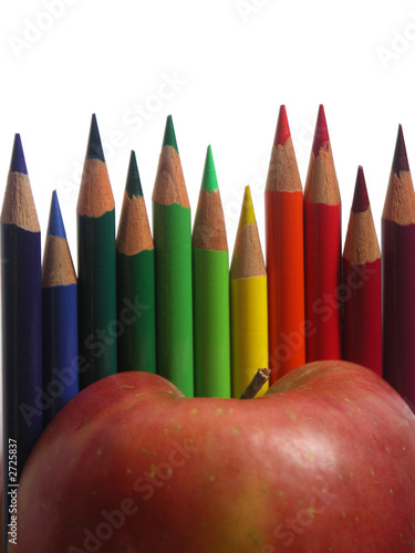 apple with colored pencils apple with colored pencils