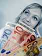 Foto: frau mit geld frau mit geld