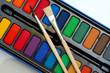 watercolors and brushes