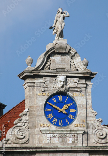 nude statue & clock on top of leipzig city hall nude statue & clock on top of leipzig city hall