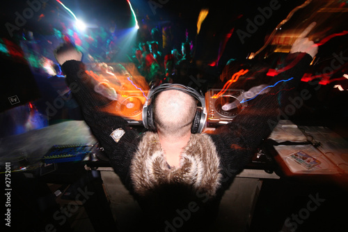 Photo: a dj salutes his crowd a dj salutes his crowd
