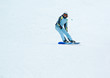 a girl riding on the snowboard