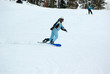 a girl on the snowboard