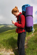 backpacker girl with phone