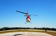 rear view of helicopter taking off