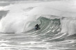 bodyboarder inside a tube