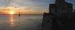 sunset at the talmont church with a sailing boat, france, panora