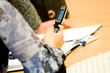 woman's hand operating mobile phone