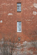 windows in an old wthered wall. windows in an old wthered wall.