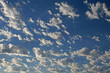 grey clouds in blue sky