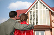 couple and house