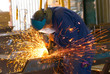 Photo: men at work grinding steel men at work grinding steel