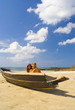 a young couple on the beach