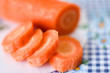 close-up sliced carrots over flower plate