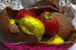 yellow easter eggs with strawberries