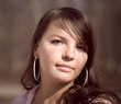 portrait of young woman in reddish tones