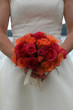 wedding bouquet held waist high