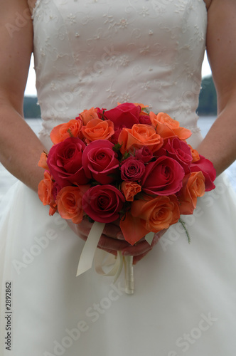 wedding bouquet held waist high